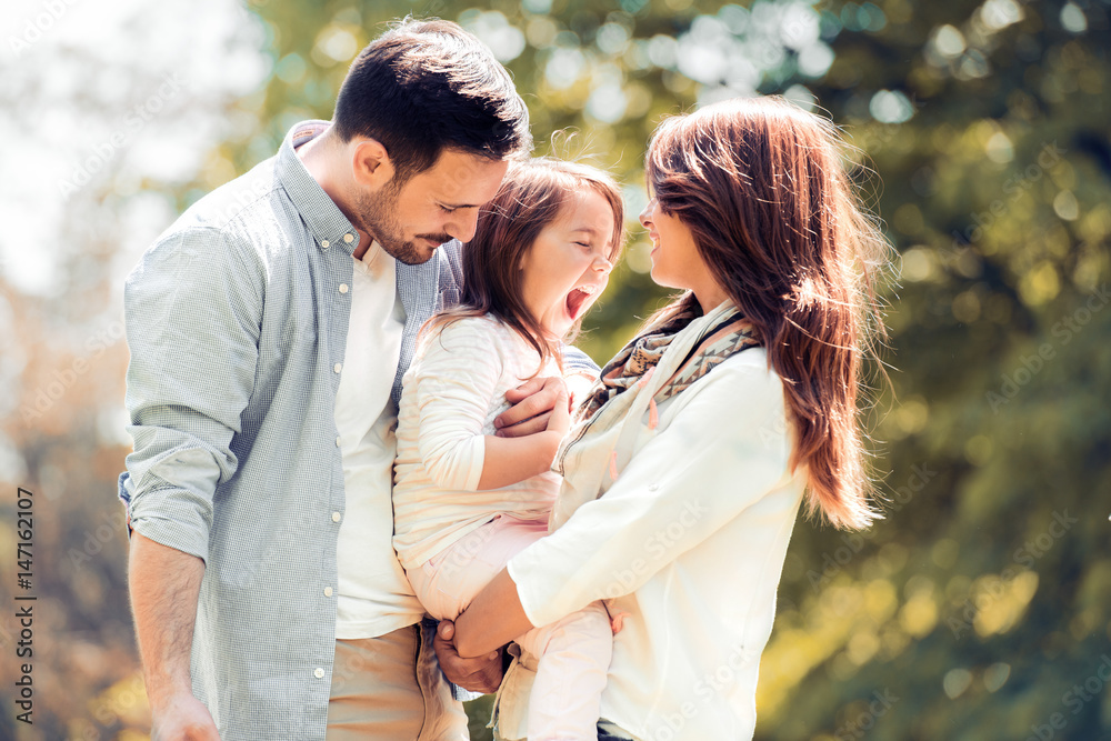 Happy family having fun outdoors Happy family having fun outdoors