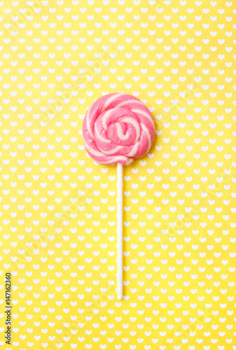 Lollipops sweets. Candy, top view flat lay on yellow background. Sweet sucker, lollipop, candy, food background