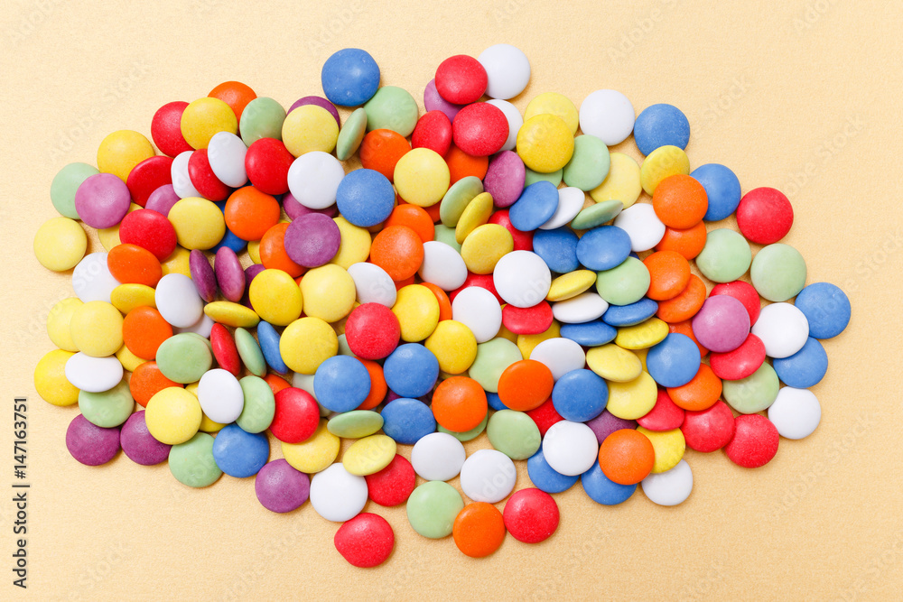 Lollipops sweets. Candy, top view flat lay on yellow background. Sweet sucker, lollipop, candy, minimal concept above decoration, food background Lollipops sweets. Candy, top view flat lay on yellow background. Sweet sucker, lollipop, candy, minimal concept above decoration, food background
