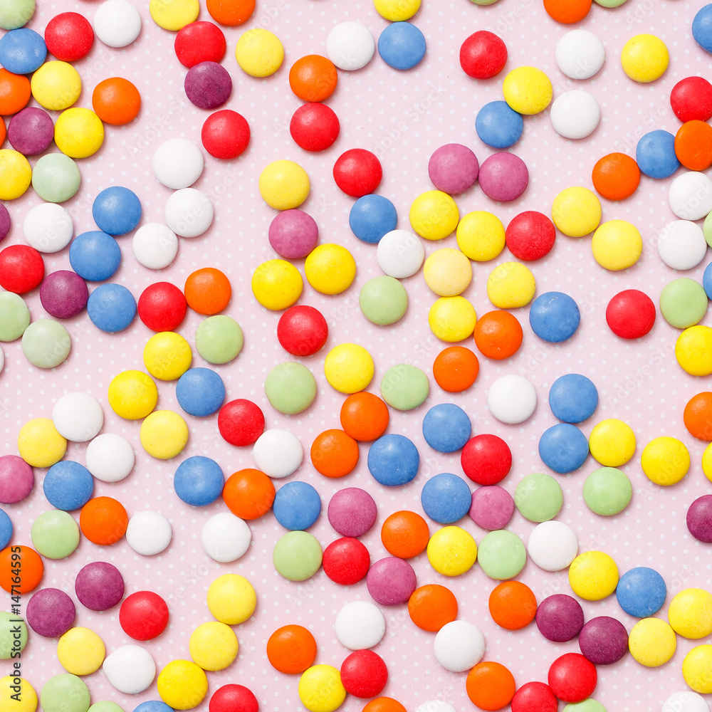 Lollipops sweets. Candy, top view flat lay on pink background. Sweet sucker, lollipop, candy, minimal concept above decoration, food background Lollipops sweets. Candy, top view flat lay on pink background. Sweet sucker, lollipop, candy, minimal concept above decoration, food background