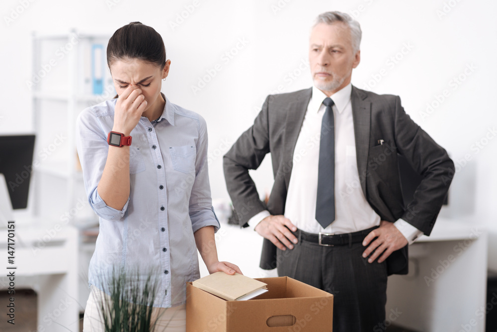 Young office worker feeling sadness Young office worker feeling sadness