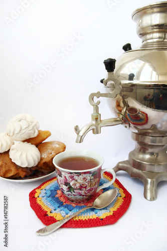 Samovar and cup on a light background