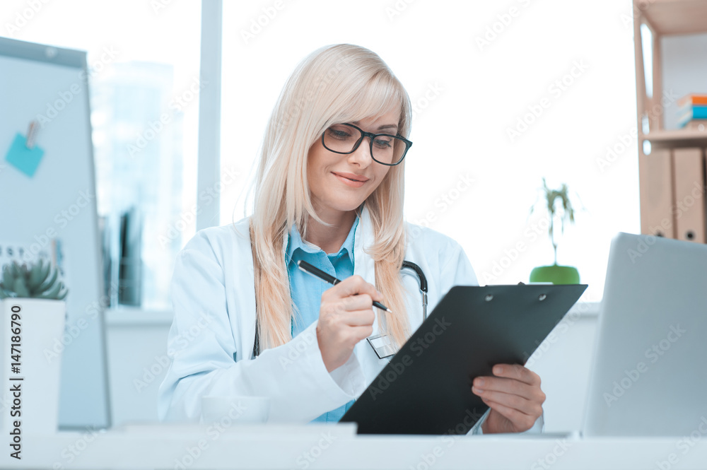 Young woman doctor occupation in the hospital office Young woman doctor occupation in the hospital office