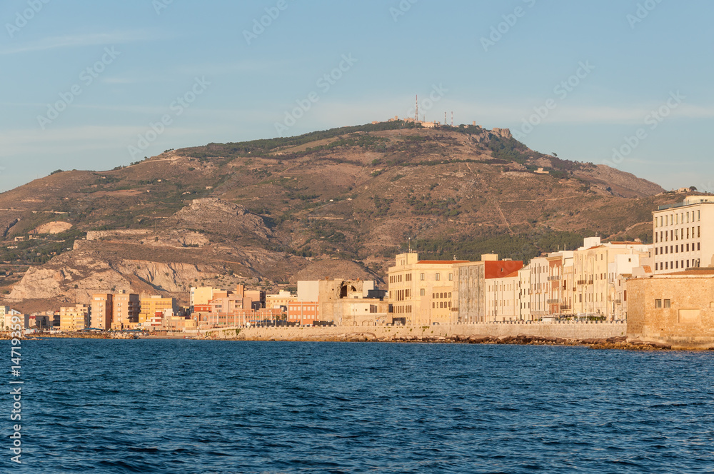 Panoramic view of the harbor in Trapani with colored old houses, Sicily