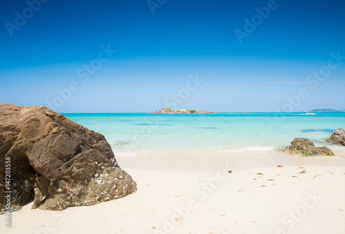 Stone on Sea beach blue sky sand sun daylight relaxation at samaesarn island, Thailand.