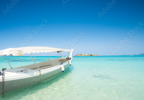 White boat and beautiful blue ocean at samaesarn island, Thailand. photo
