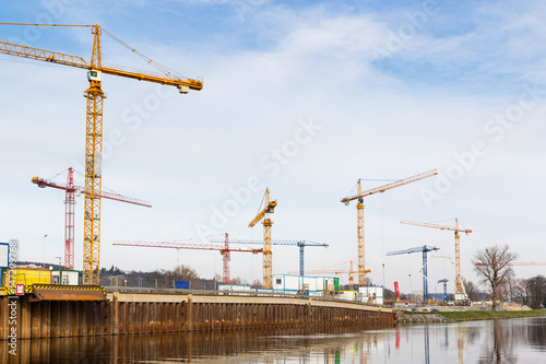 Large construction site with tower cranes