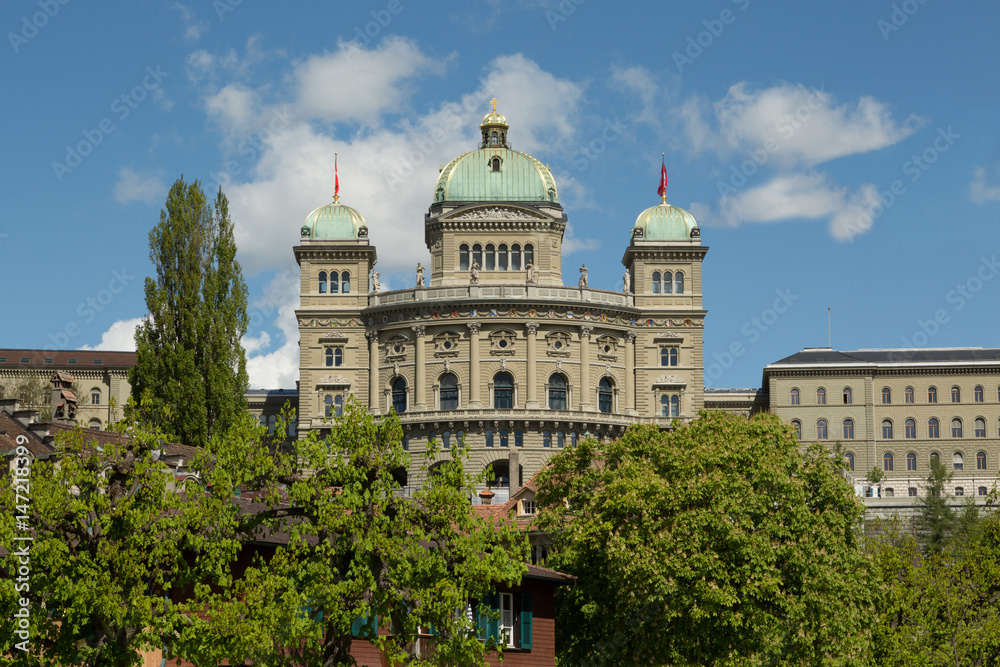 A photograph of the Federal Parliament Building in Bern, Switzerland. 