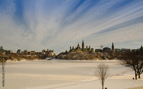 Canadian Parliament and frozen Ottawa river. Ottawa, Canada in the winter