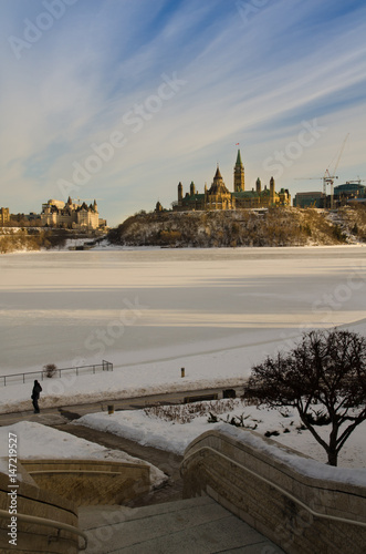 Canadian Parliament and frozen Ottawa river. Ottawa, Canada in the winter