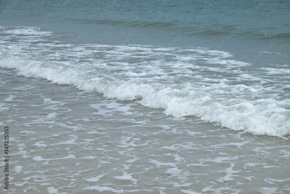 Soft Wave Of Blue Ocean On the Beach. Background