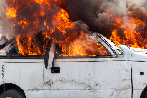burning car burning car - Exercise firefighters