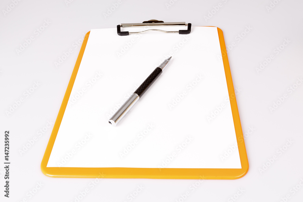 pen or pencil on empty paper in clipboard on white - business concept pen or pencil on empty paper in clipboard on white - business concept