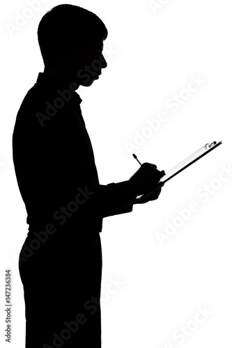 Silhouette of a business man signing a loan