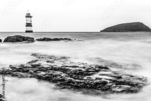 Trwyn Du or Penmon Lighthouse between Dinmor Point near Penmon and Ynys Seriol, or Puffin Island, at the eastern extremity of Anglesey North Wales. 