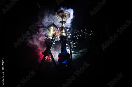 Fotografie Hookah hot coals on shisha bowl with black background