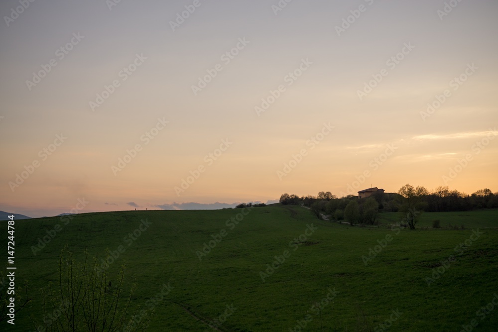 Sunset on meadow with hills and tree. Slovakia Sunset on meadow with hills and tree. Slovakia