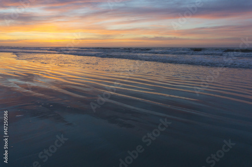 Sunrise view of the Atlantic Ocean at North Myrtle Beach, South Carolina. © jdwfoto