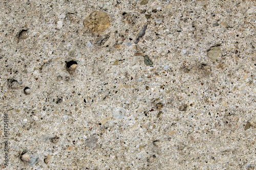 Natural conglomerate rock used as a block in construction industry