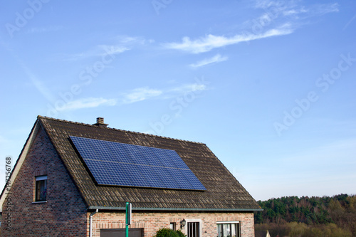 Photovoltaics on the roof of a residential building for alternative energy production
