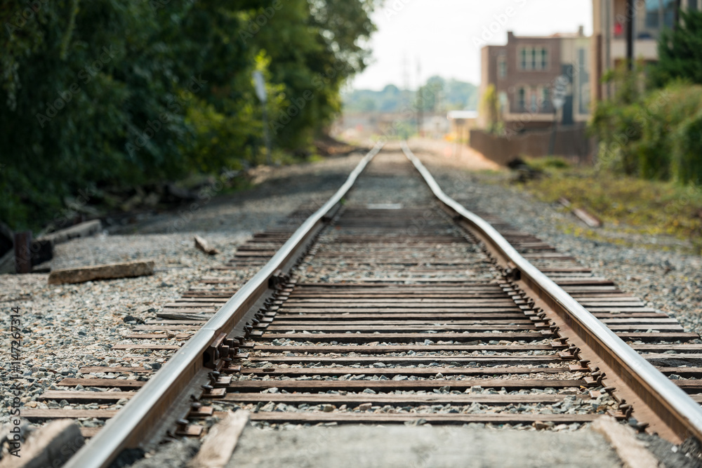 Railroad tracks with a shallow depth of field and vanishing perspective