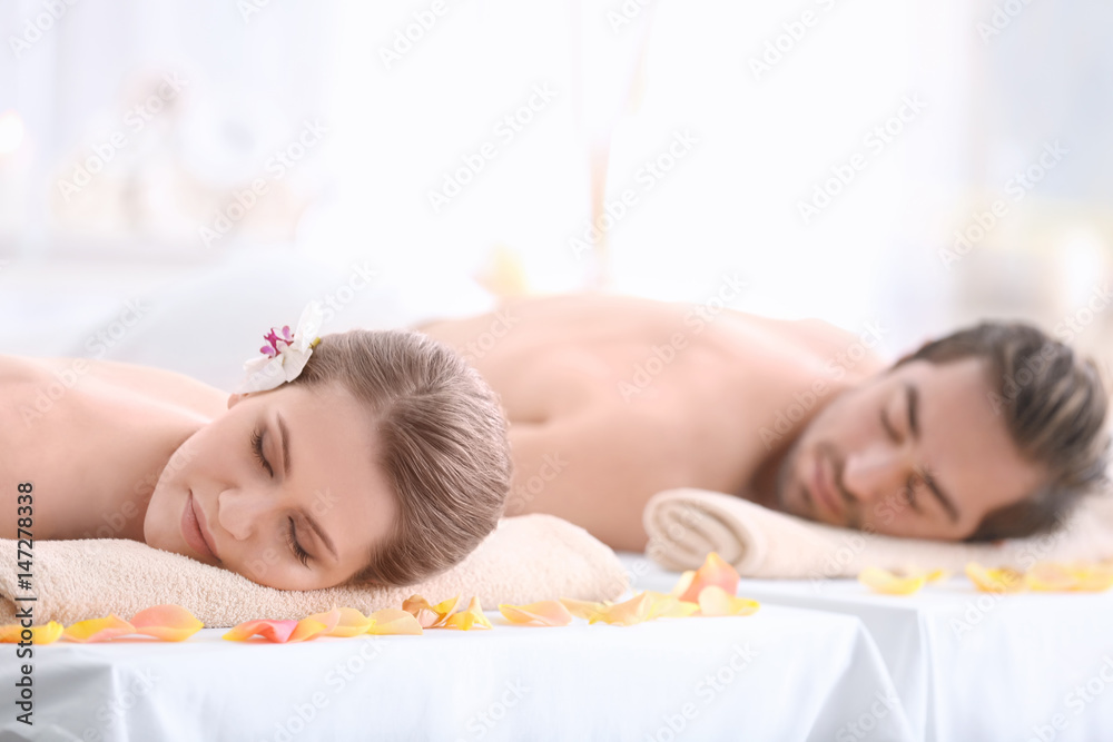 Young happy couple relaxing in spa salon Young happy couple relaxing in spa salon