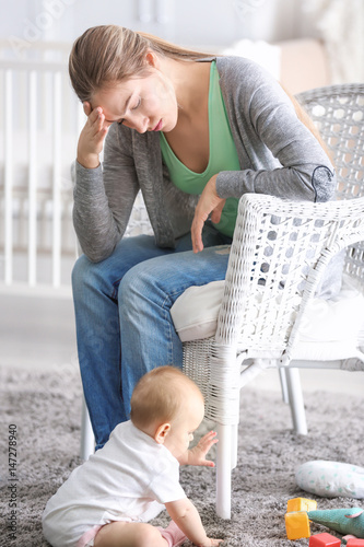 Depressed young woman with ...