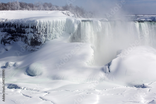 Winter time, frozen Niagara Waterfalls in Canada. 