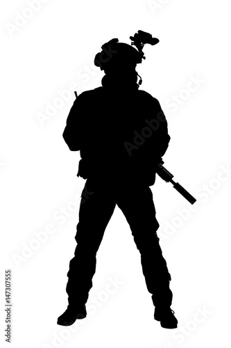 Security forces silhouette with weapon. Studio shot photo