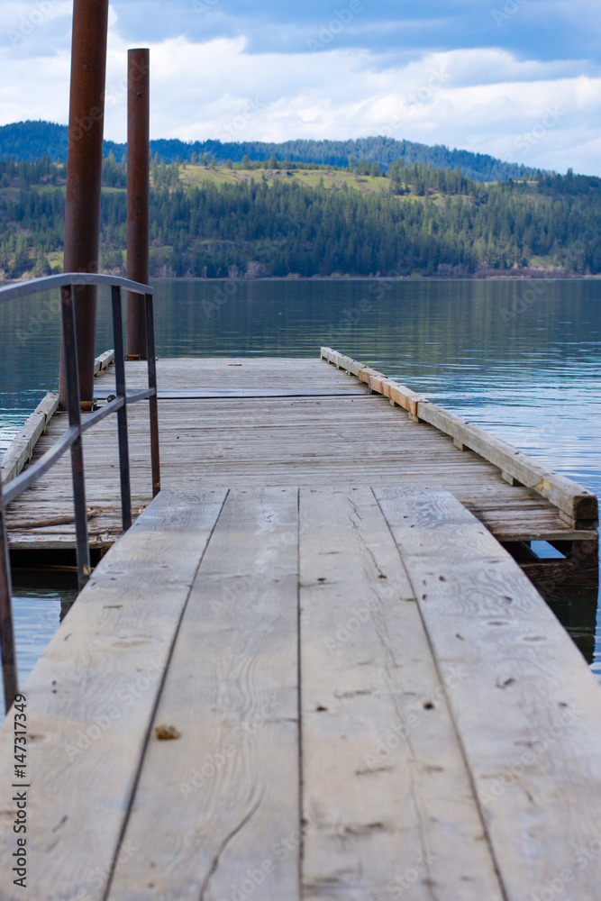 Bridge to wooden floating dock on Lake Coeur d'Alene.