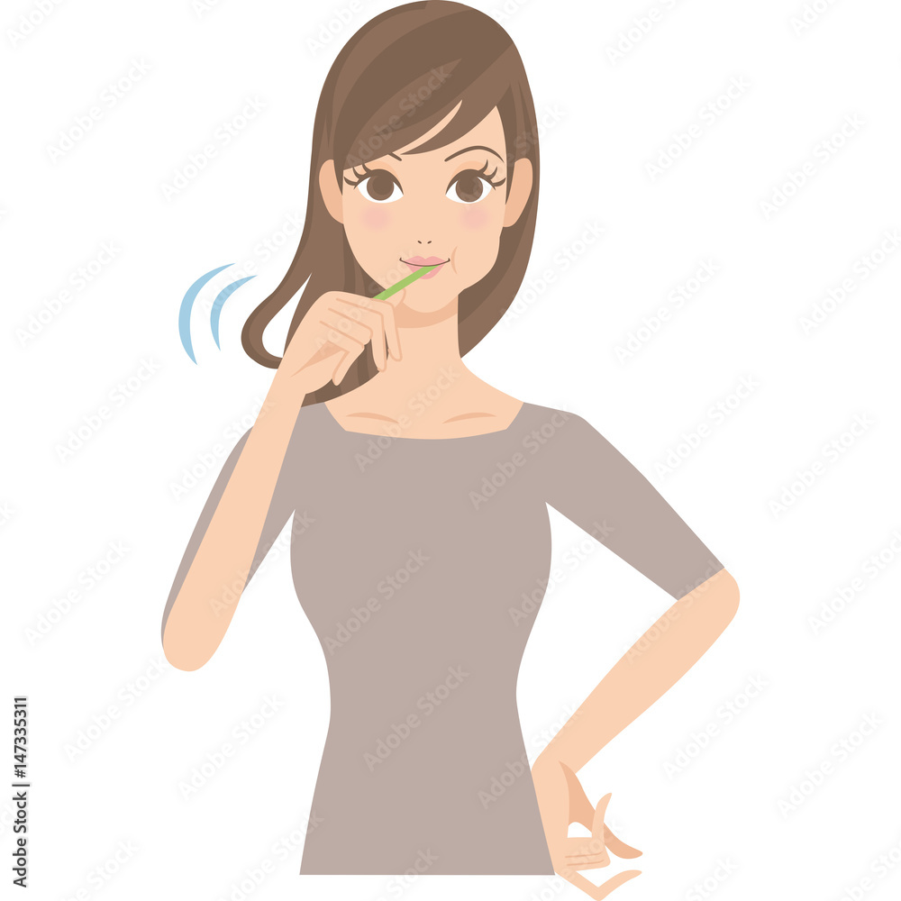 歯磨きをする女性