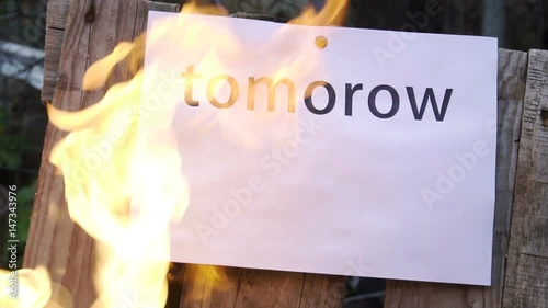 flaming word tomorow photo