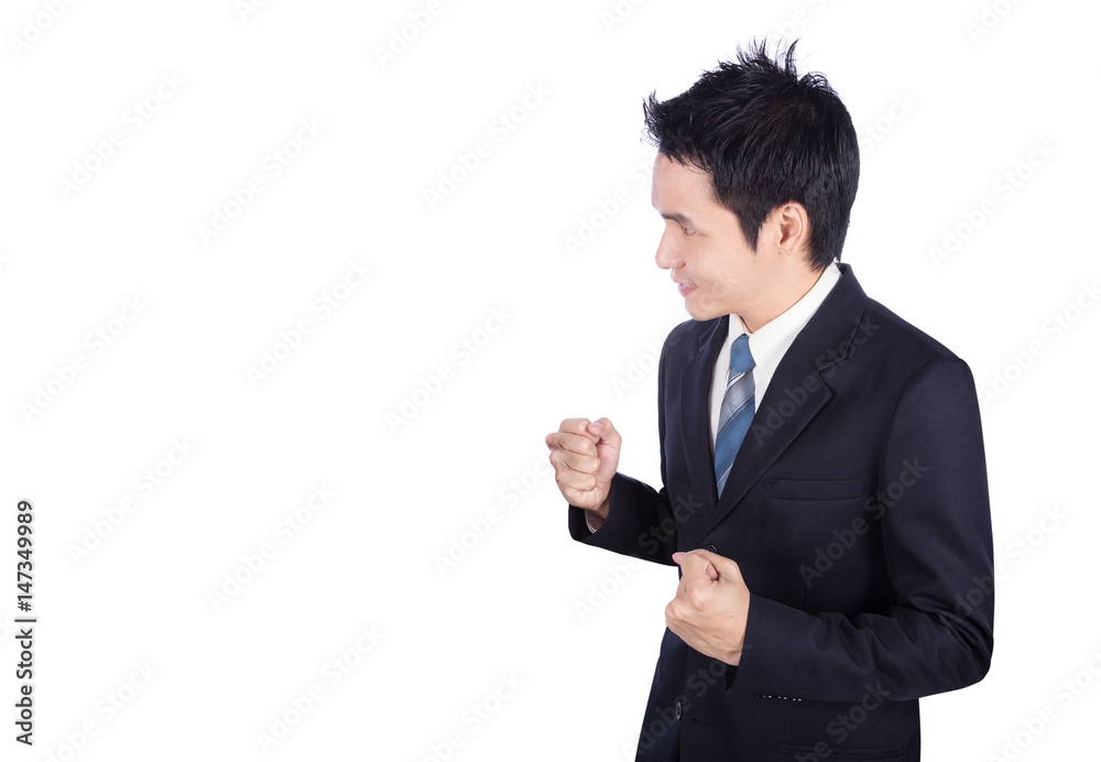 Successful business man with arm raised isolated on white Successful business man with arm raised isolated on white