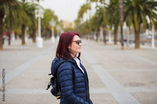 Young pretty tourist woman relaxed enjoying her holidays feeling happy and free.Spain-Barcelona holidays.