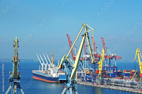 Port cargo crane, ship and container © Unkas Photo