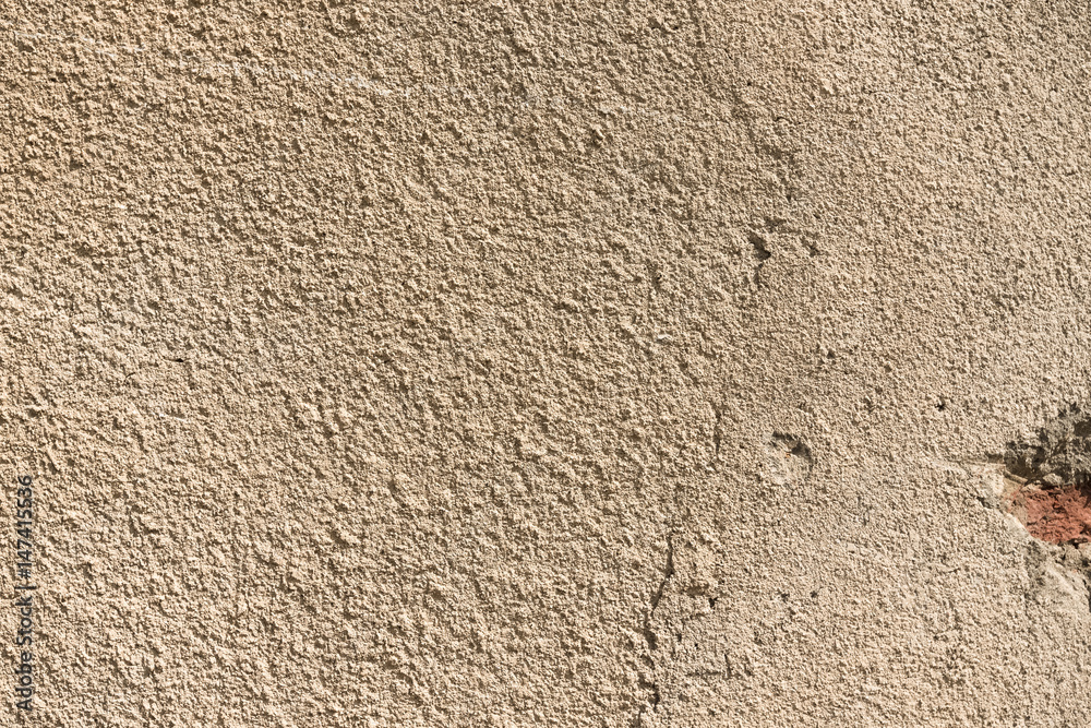 Light plastered wall with crack for background. Close up detail. Toned Light plastered wall with crack for background. Close up detail. Toned