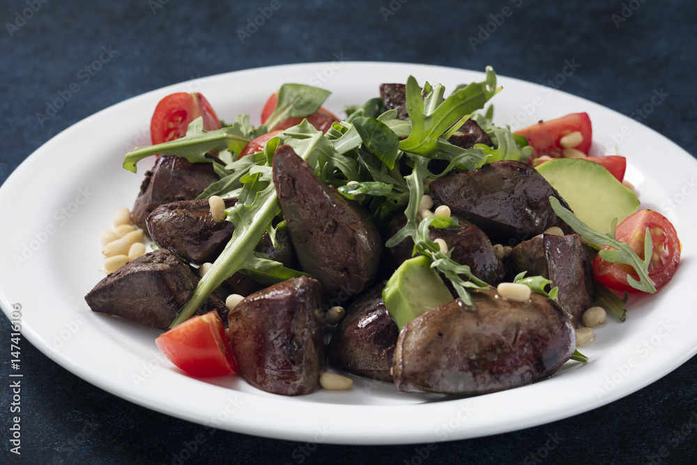 Warm salad from turkey liver