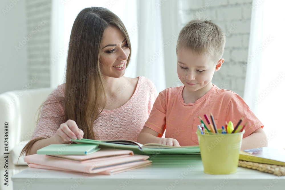 A woman with a child reading A woman with a child reading