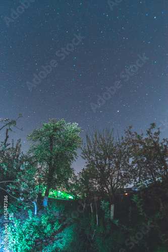 Starry sky in the village.