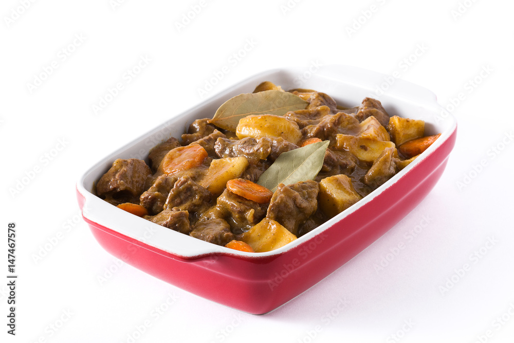 Beef meat stewed with potatoes, carrots and spices in ceramic pot isolated on white background
Beef meat stewed with potatoes, carrots and spices in ceramic pot isolated on white background