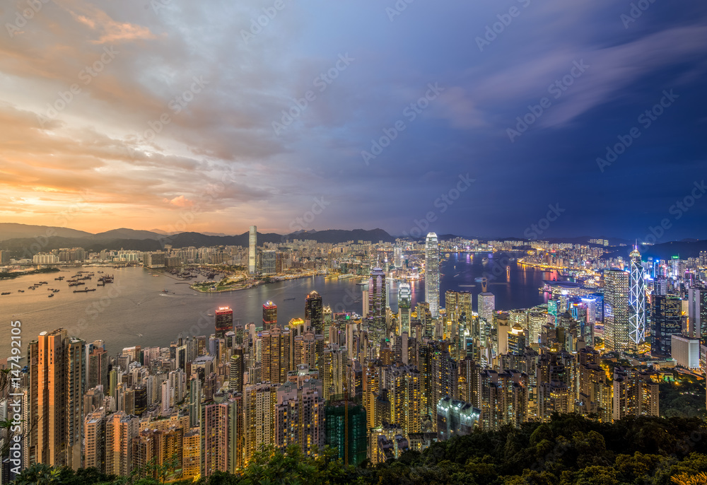 Panorama view of City and Harbour at Sunset and Night - Victoria Harbour, Hong Kong
