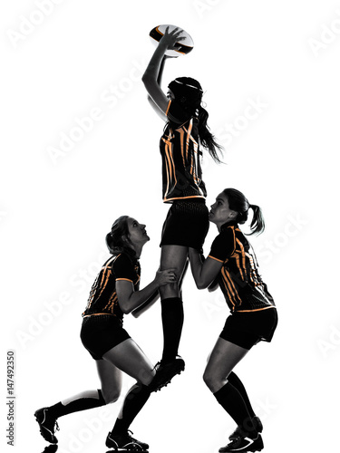 rugby women players team in silhouette isolated on white backround