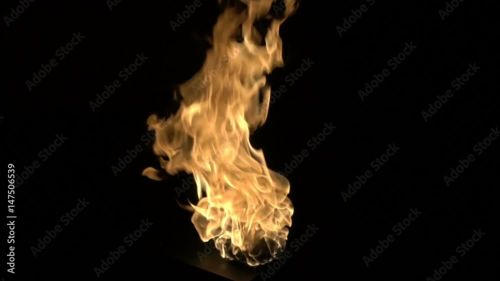 Slow motion burning gas flame blast isolated on black background. Slow motion burning gas flame blast isolated on black background.