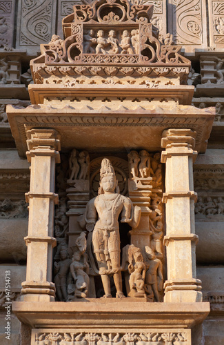 Shiva God - ancient relief at famous temple in Khajuraho, India