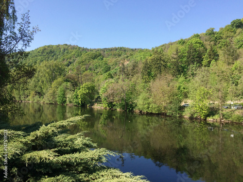 Picturesque river valley on a bright cloudless summer day