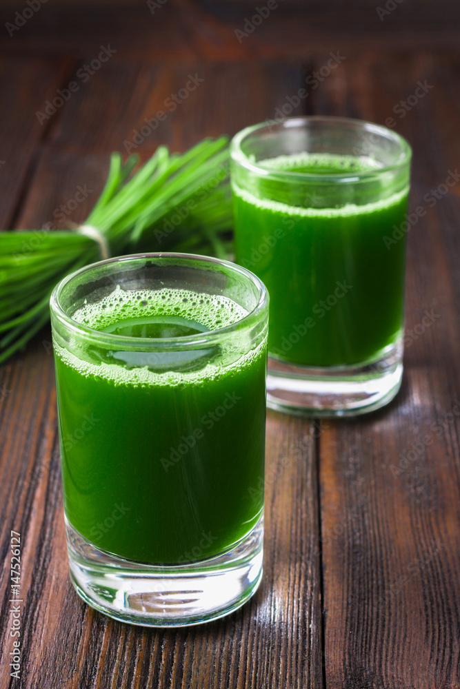 Wheatgrass shot. Juice from wheat grass. Trend of health. Wheatgrass shot. Juice from wheat grass. Trend of health.