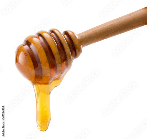 dropping honey isolated on a white background
