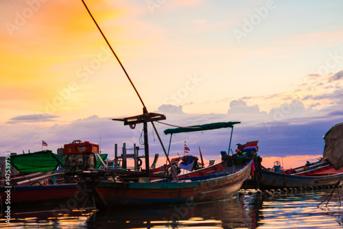 Wallpaper Mural Wooden fishery boat on sand beach sunset Torontodigital.ca