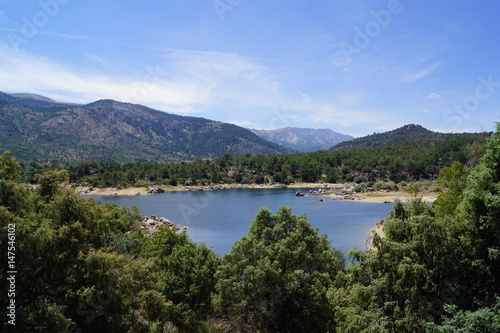 The El Burguillo Reservoir is located along the Alberche river in the province of Ávila, Spain, between the municipalities of El Tiemblo and El Barraco. photo