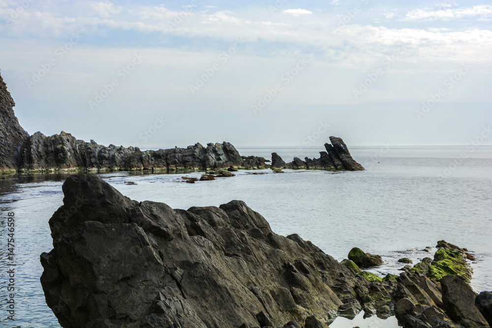 The rocks near the shore of the black sea